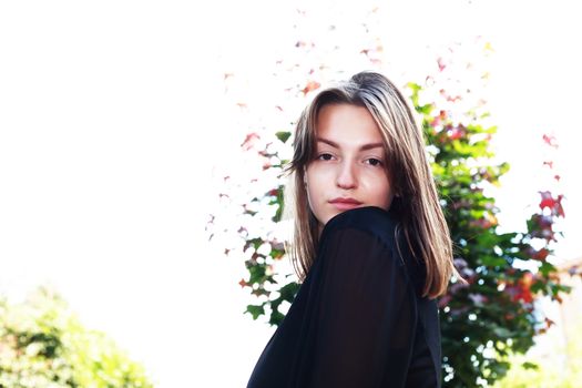 Beauty young woman against white background with tree