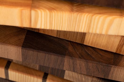 Fragments of wooden end cutting boards close up