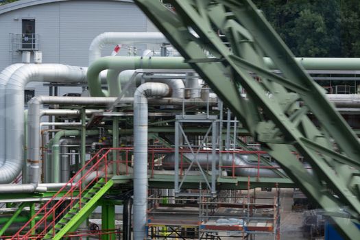 View of pipelines and towers of the oil and gas refinery.