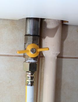 yellow gas faucet in the apartment