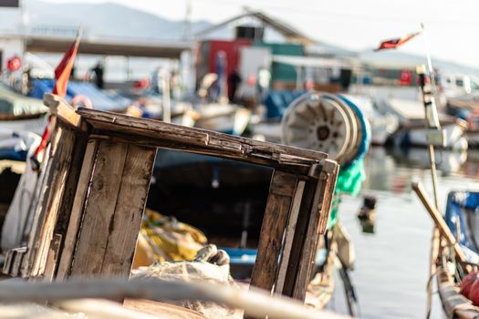 a shoot from a fisherman bay - there is some wooden boxes with blurry background. photo has taken at izmir/turkey.
