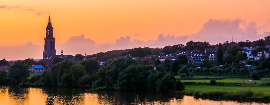 beautiful city skyline of Rhenen during sunset, beautiful rustic town with water, The netherlands