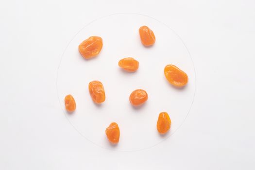 Candied kumquat isolated on white backgroud. 