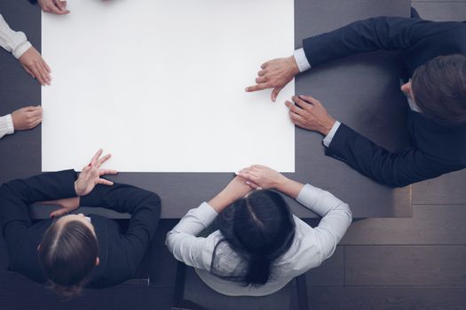 Group of business people with blank paper with copy space, new project concept