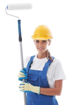 Young beautiful handywoman with paint roller isolated on white background