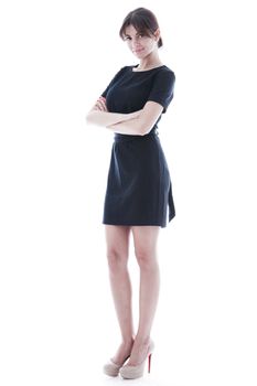 Full body portrait of young business woman in dress isolated on white