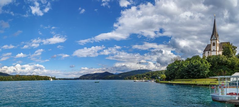 Panoramic view of the Worthersee lake with Maria Worth church, Carinthia, Austria