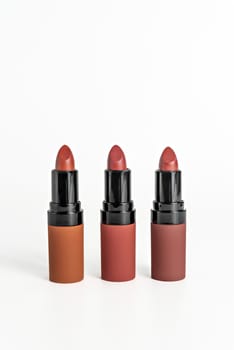 Set of colorful lipsticks on white background