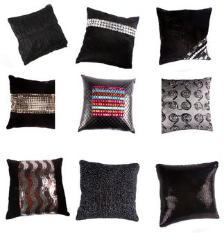 A set of luxurious pillows and cushions with beautiful designs, on white studio background.