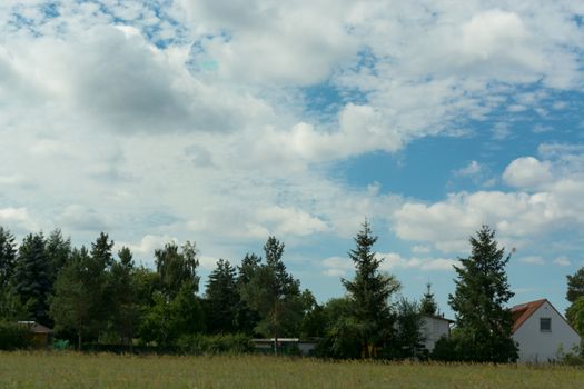 Countryside panorama blue sky Windmill in the background