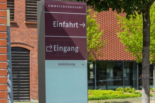 Entrance to the Federal Environmental Agency in Dessau in the foreground a sign with inscription in German - entrance, entrance Federal Environment Agency