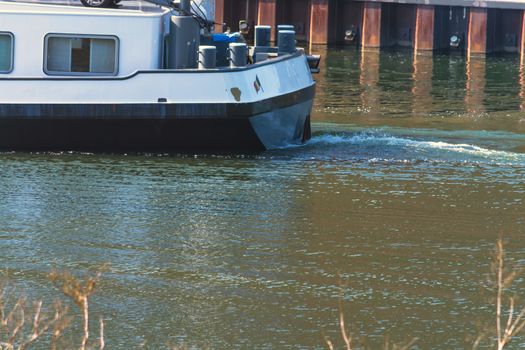 Domestic transport by ship across the Moselle in Germany on a bright summer day.