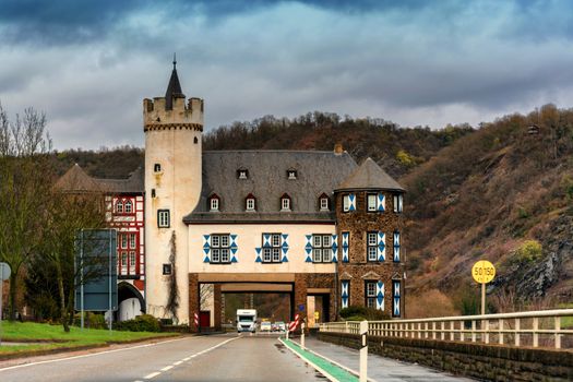 Castle of the Leyen, road passing the castle near Kobern Gondorf on the Moselle River, Germany.