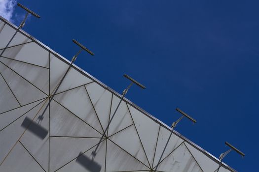 repeating concrete structure and blue sky