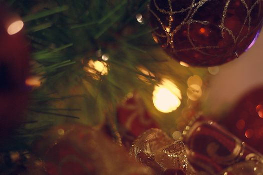 Christmas spheres and lights in dark tones and cat