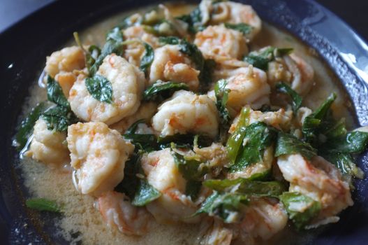 Thai food, shrimp ,with chili pepper and Thai basil.