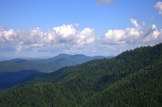 View at the top of the mountains from a high hill. Altai, Siberia, Russia.