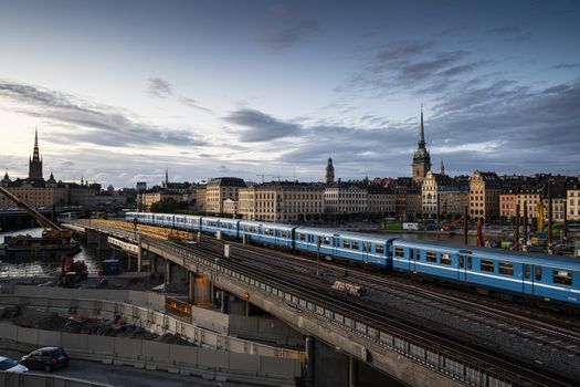 Stockholm, Sweden. September 2019. A view of metro train in the city center at sunset