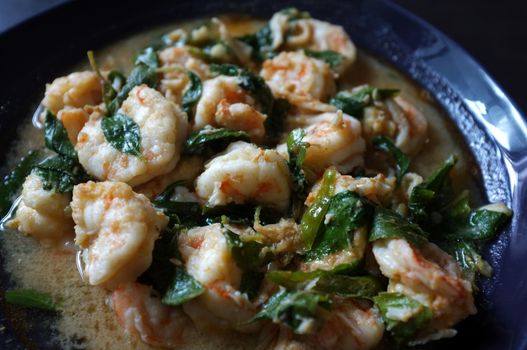 Thai food, shrimp ,with chili pepper and Thai basil.