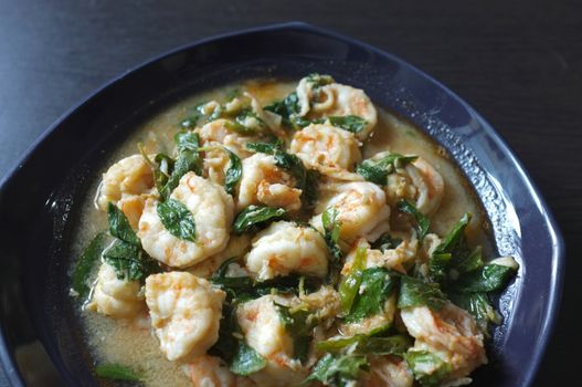 Thai food, shrimp ,with chili pepper and Thai basil.