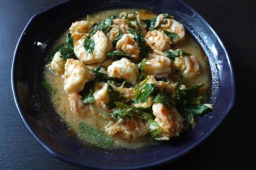 Thai food, shrimp ,with chili pepper and Thai basil.
