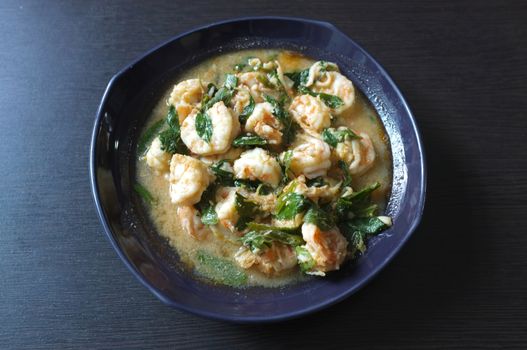 Thai food, shrimp ,with chili pepper and Thai basil.