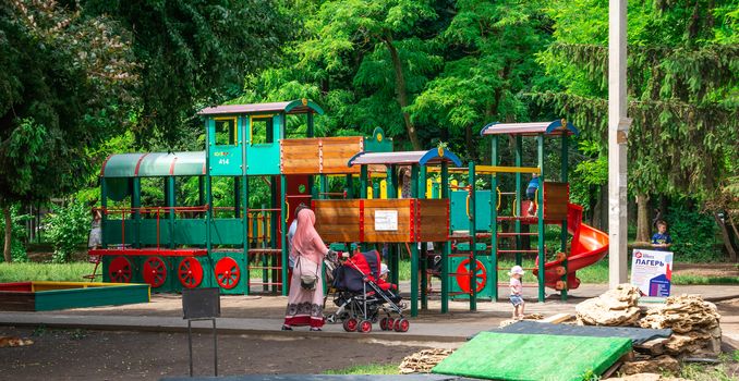 Odessa, Ukraine - 06.09.2019. People walk and relax in Gorky Park in Odessa, Ukraine, on a hot summer day