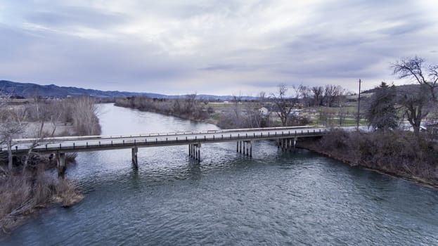 Two lane bridge over the water of a river