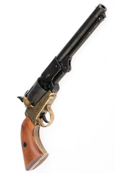 Old revolver on an isolated studio background