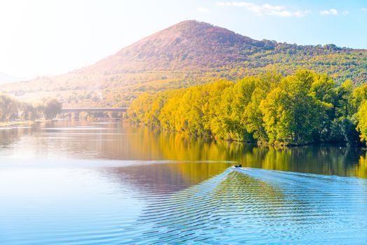 Radobyl Mountain in Ceske Stredohori, Central Bohemian Uplands. View from Labe River in Litomerice, Czech Republic.