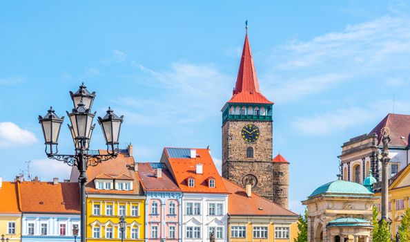 Colorful renaissance houses and Valdice Gate at Wallenstein Square in Jicin, Czech Republic.