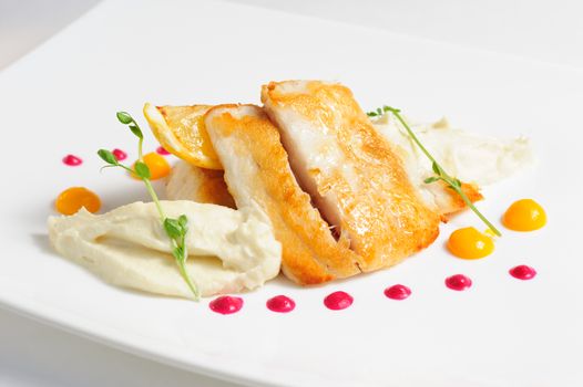 Fried zander with celery puree and sauce