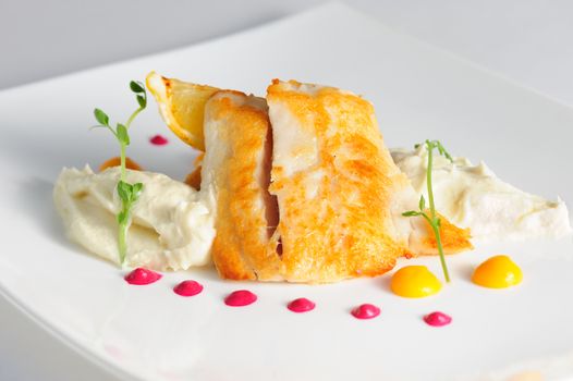 Fried pikeperch with celery puree and sauce