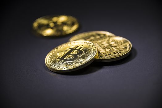 Gold coin Bitcoin on dark background. Cryptocurrency