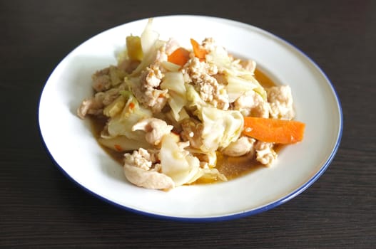 Stir fried slice cabbage and pork with fish sauce