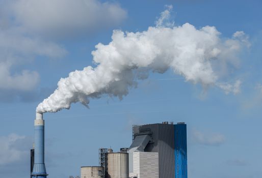 smoke pollution of a power plant in holland near rotterdam in the area europoort