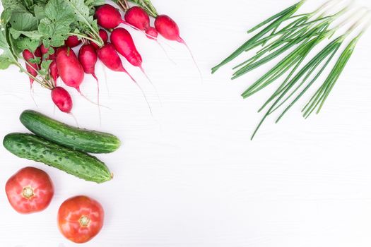 Fresh vegetables from the garden on a white background