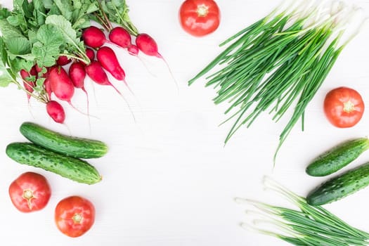 Fresh vegetables from the garden on a white background