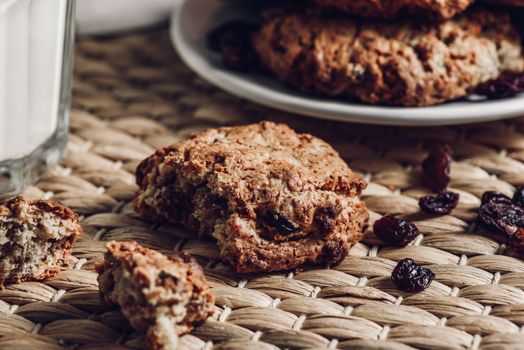 Oatmeal Cookie with Raisin on Braided Tablecloth. Close Up.