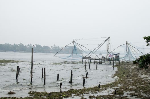 In India, Chinese fishing nets are fishing nets that are fixed land installations for fishing