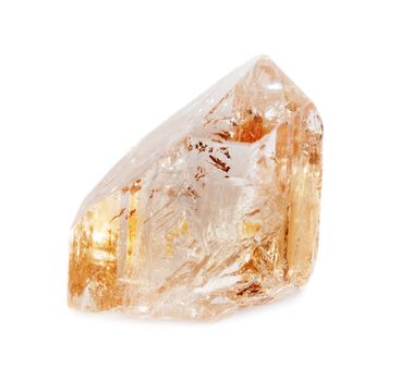 Natural crystal of clear precious wine topaz isolated on a white background