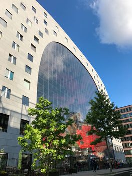 The gigantic window of the Markthal, famous market hall in central Rotterdam