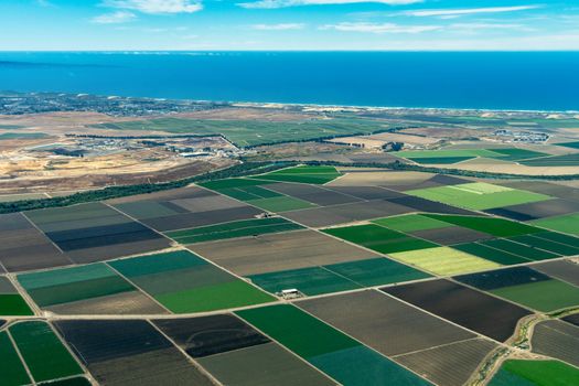 Pacific coast of California with farmland close to the cities of Salinas and Monterey. The picture was taken in the early July.