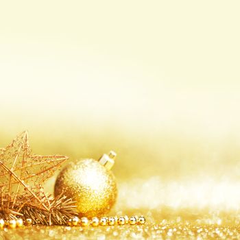 Golden beautiful christmas decor on glitter background