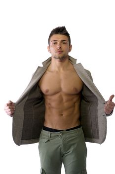 Confident, attractive young man with open jacket on muscular torso, ripped abs and pecs. Side view