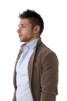 Handsome young man portrait, standing isolated on white, profile position