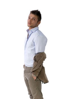 Handsome young man portrait, standing isolated on white, profile position