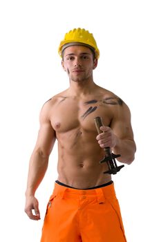 Muscular young construction worker shirtless with hardhat, isolated on white background, looking at camera