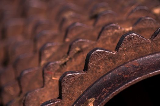 Closeup of a rusty old roller farm equipment