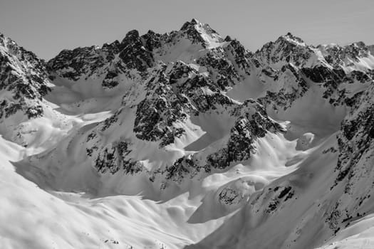 Beautiful mountaintops covered by snow